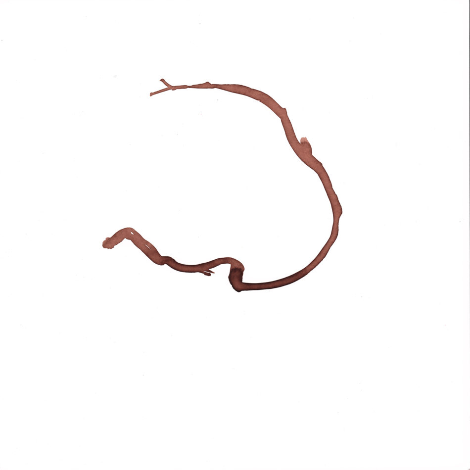 a small curved stick painted with brown natural ink on white paper